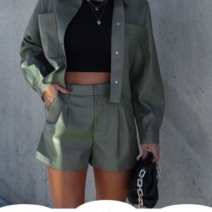 Olive faux leather pocketed shorts